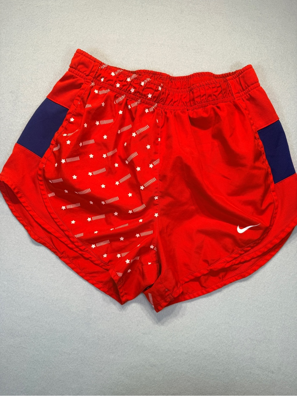 Nike Women's Red Athletic Shorts with Navy Panels and Star Print size S